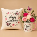 Happy Birthday gift set with butterfly cushion, ceramic mug filled with pink and blush roses and baby's breath