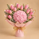 Pink hydrangea bouquet with pink tulips or roses, baby's breath, eucalyptus and blush wrapping