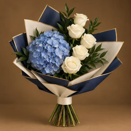 Blue hydrangea with white roses and fresh greenery in navy and ivory wrapping