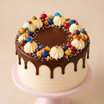 Chocolate drip cake with cream buttercream, ganache drip, colorful Candy toppings or red and pink Hearts decorations