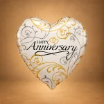Elegant heart-shaped Happy Anniversary foil balloon with gold and silver decorative detailing