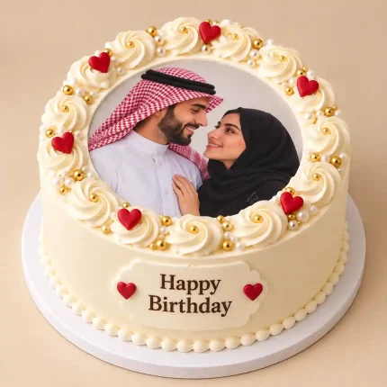 Romantic photo cake with edible photo topper, cream buttercream swirls, red fondant hearts and gold pearls