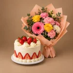 Strawberry cream cake with yellow roses pink carnations and gerbera bouquet