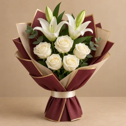 White lilies and white roses with fresh greenery in maroon and warm-beige wrapping